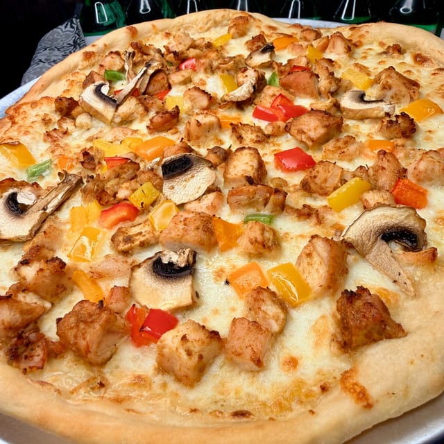Tandoori Chicken Pizza 12”.